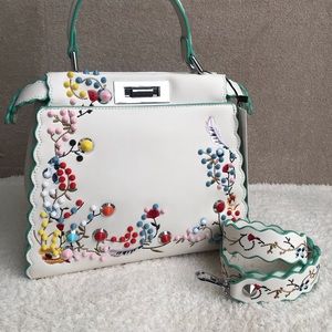 Peekaboo unbranded embellished bag.